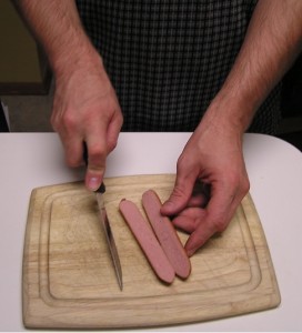 Slicing Hot Dogs length wise should greatly reduce choking risk