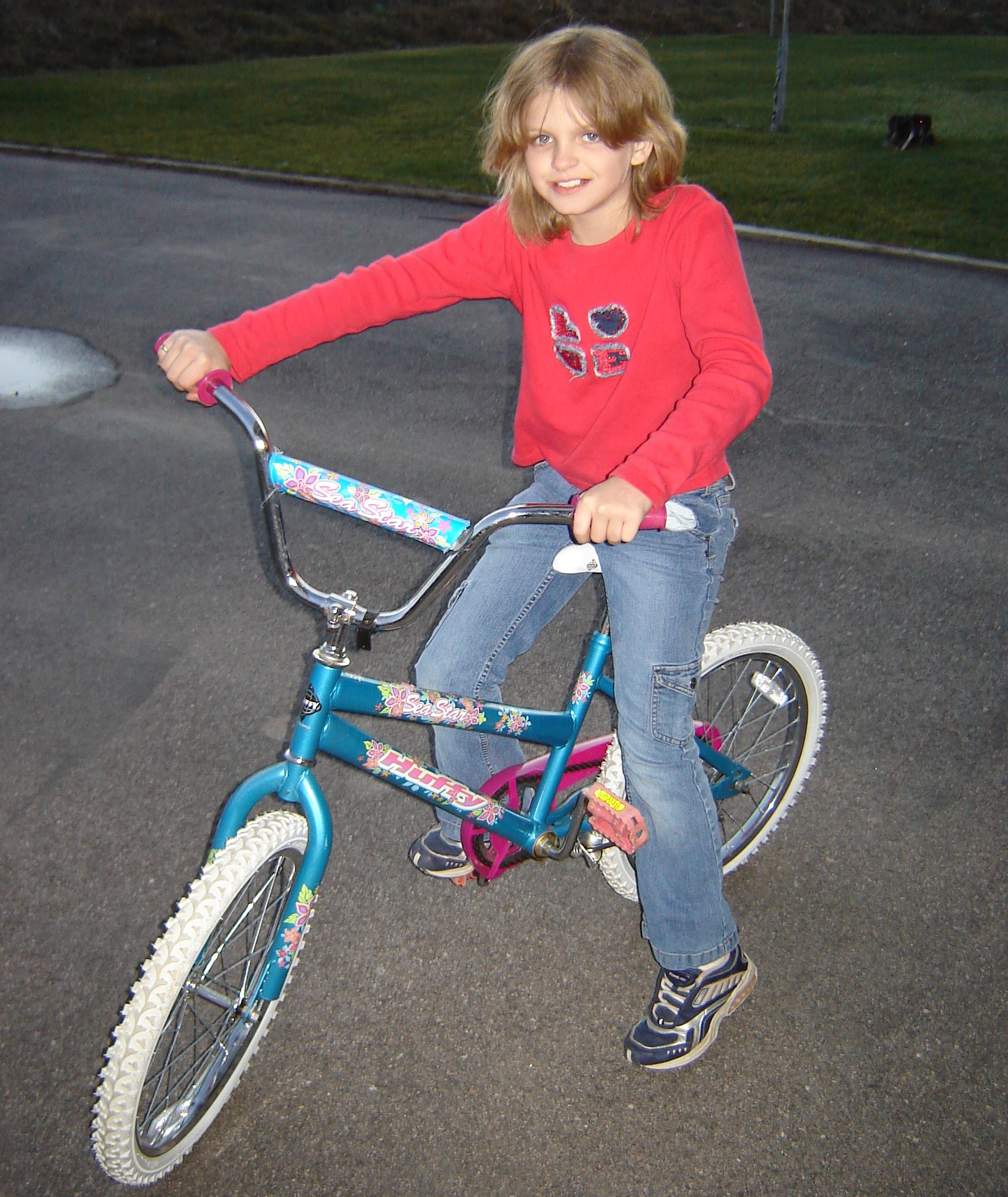 Girl-on-bike-no-helmet - Keep Your Child Safe.org